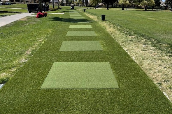 San Francisco Outdoor tee line with light green synthetic grass boxes inside a dark green synthetic grass strip